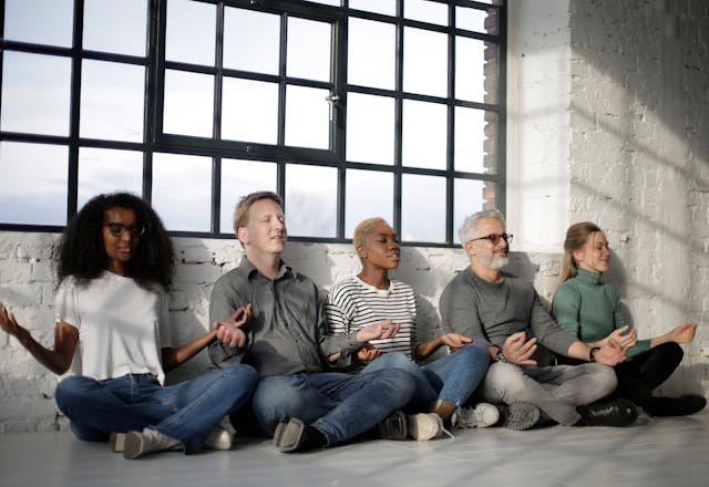 Corporate wellness sound healing session for teams