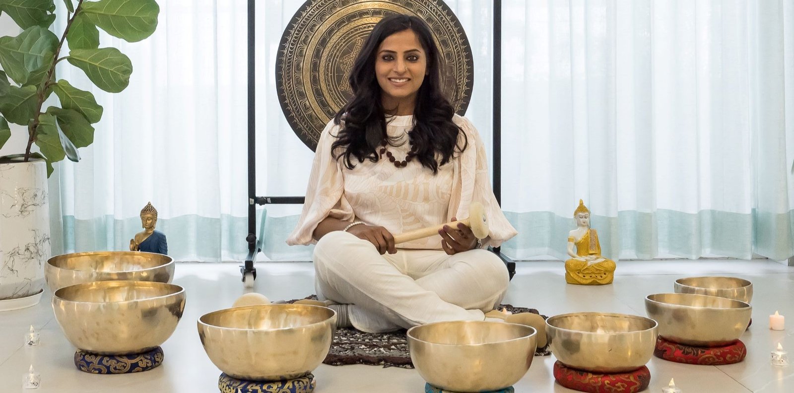 Sound healing session with singing bowls in a peaceful setting